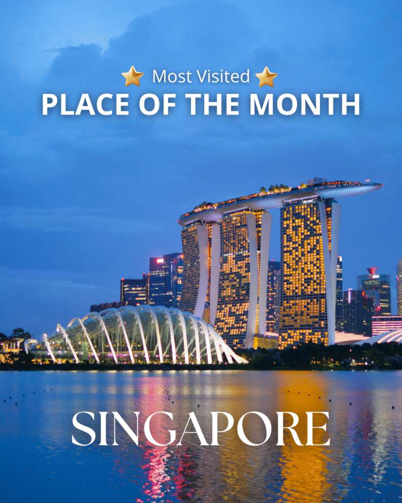 Singapore skyline with Marina Bay Sands and waterfront at night.